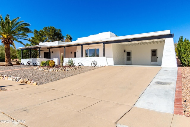 view of front of house with a carport