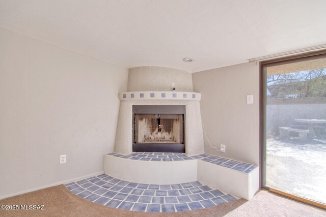 spare room featuring light colored carpet