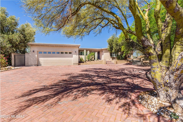 view of front of property with a garage