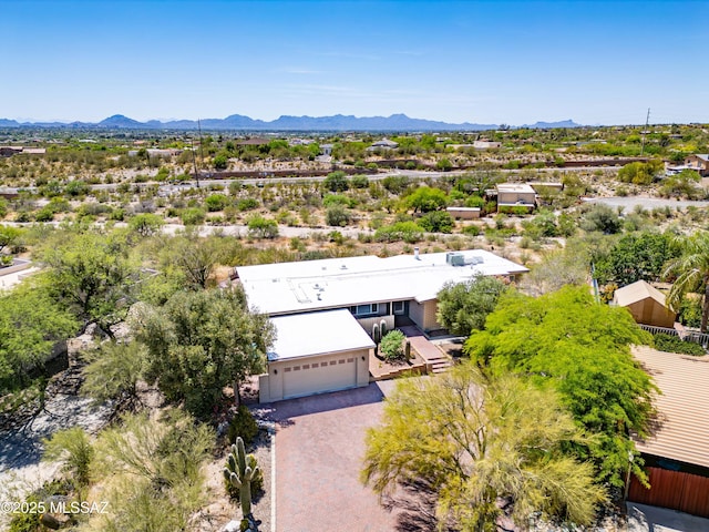 drone / aerial view featuring a mountain view