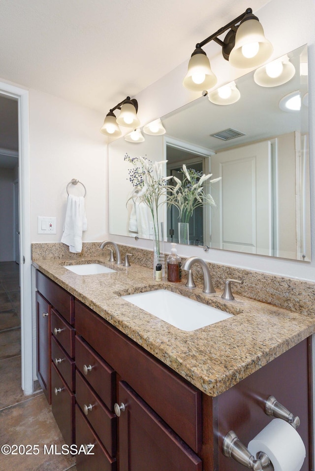 bathroom with vanity and tile patterned floors