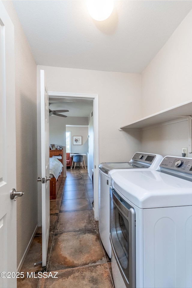 laundry room with separate washer and dryer and ceiling fan