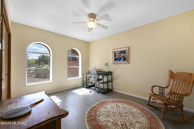 tiled home office with ceiling fan