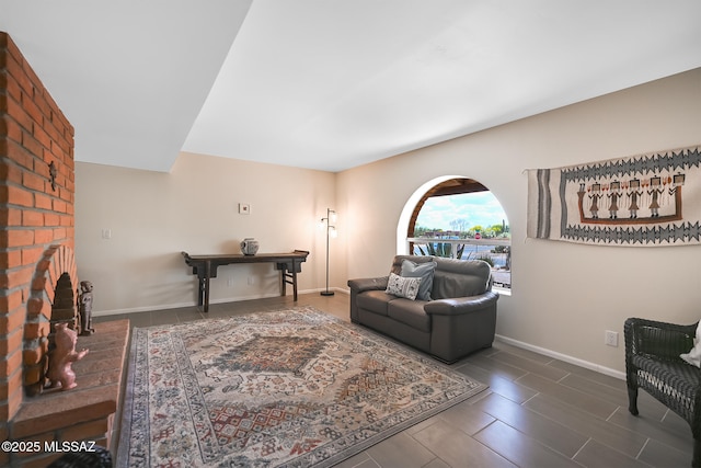 living room featuring a fireplace