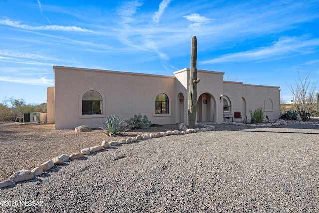 view of front of home featuring stucco siding