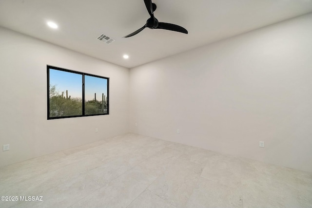 empty room featuring ceiling fan