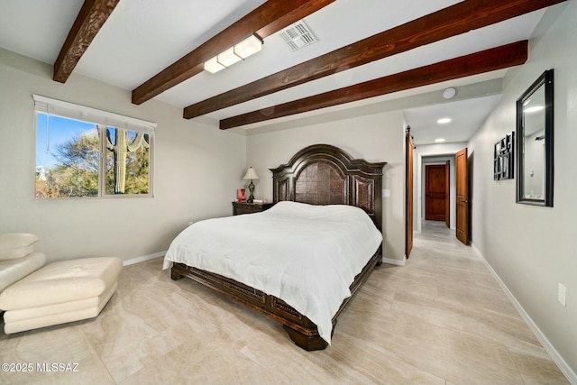 bedroom with beam ceiling