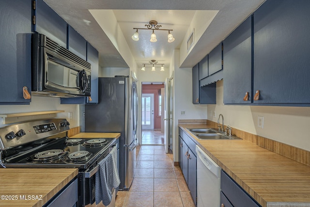 kitchen featuring blue cabinetry, sink, white dishwasher, and electric stove