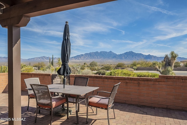 view of patio / terrace with a mountain view