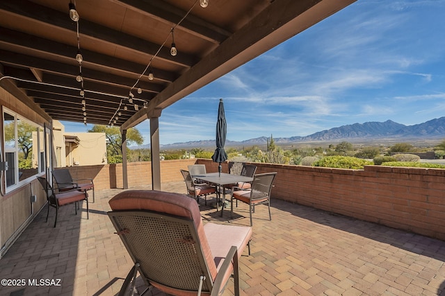 view of patio featuring a mountain view