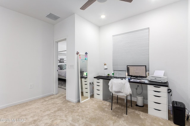 home office with light colored carpet and ceiling fan