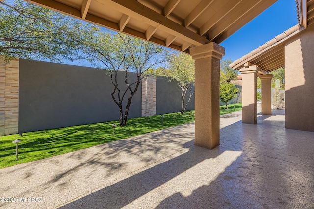 view of patio with fence