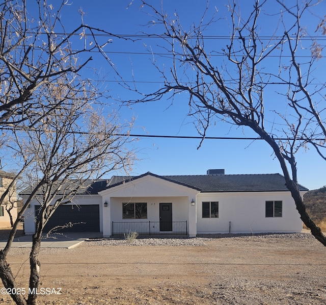 view of front of property featuring a garage