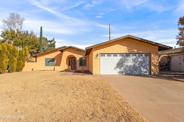 ranch-style house featuring a garage