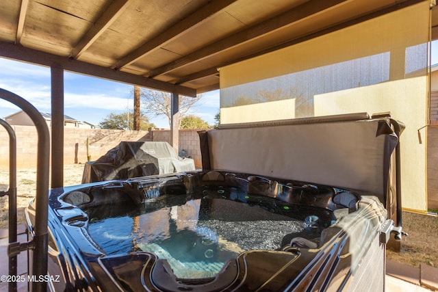 view of patio with a hot tub