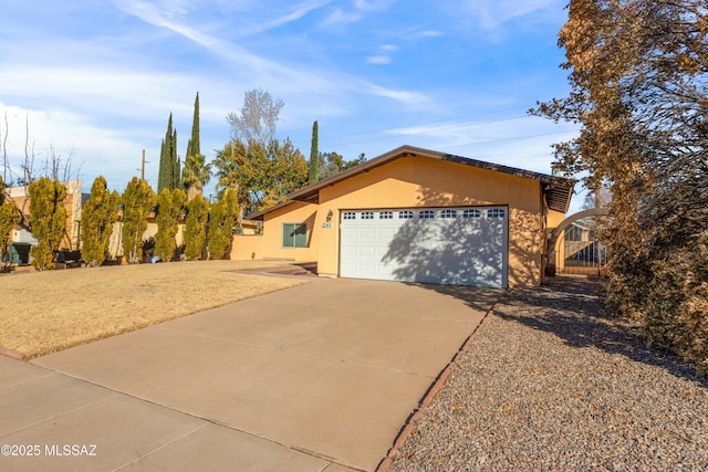 single story home featuring a garage