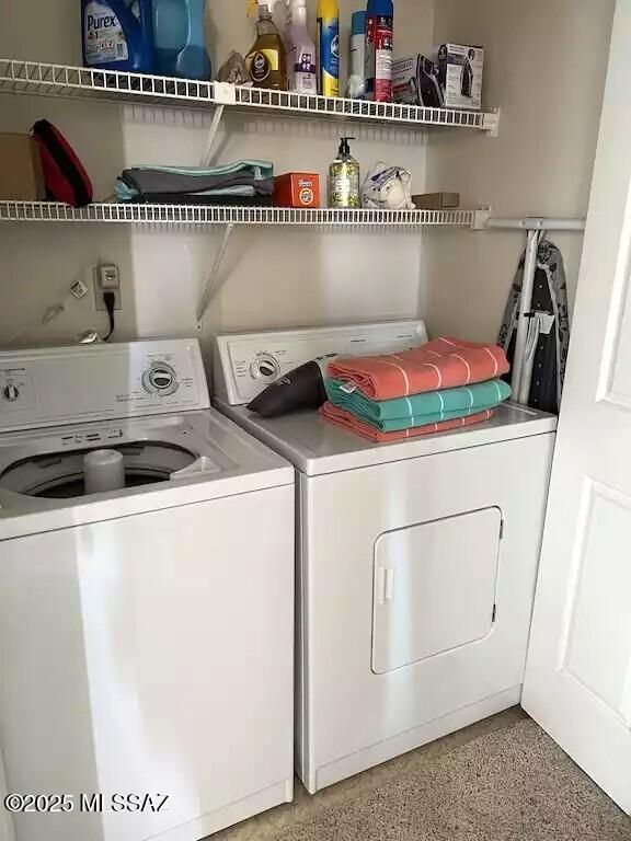 laundry area featuring independent washer and dryer