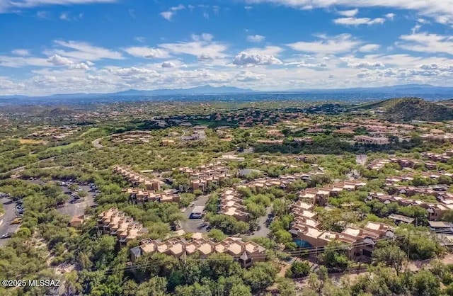 drone / aerial view featuring a mountain view