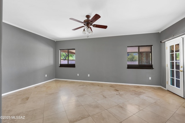 empty room with crown molding, light tile patterned flooring, and ceiling fan