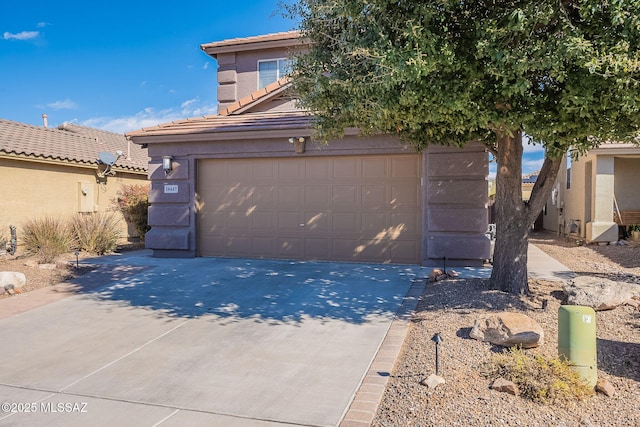 view of front of house with a garage