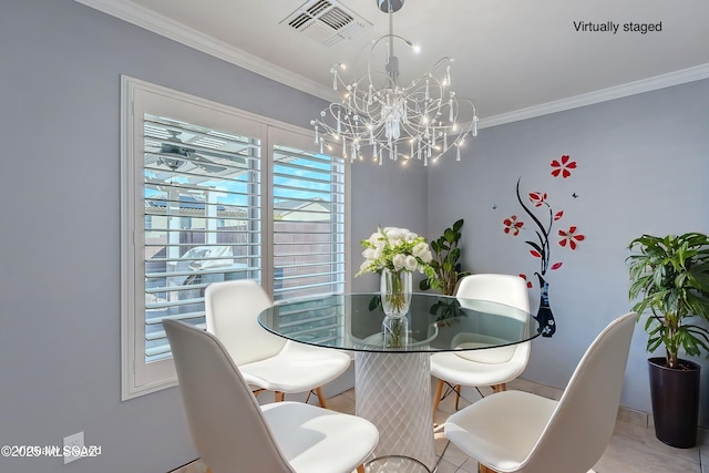 dining area featuring an inviting chandelier and crown molding