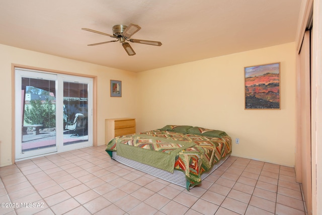 bedroom with light tile patterned floors, access to outside, a closet, and ceiling fan