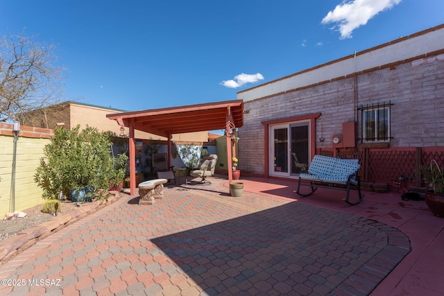 view of patio / terrace featuring fence