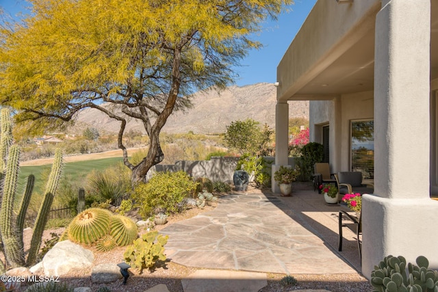 view of patio with a mountain view