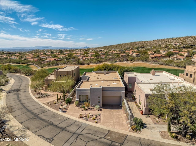 birds eye view of property featuring a residential view and a mountain view