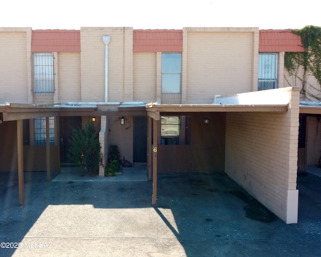 exterior space featuring a carport