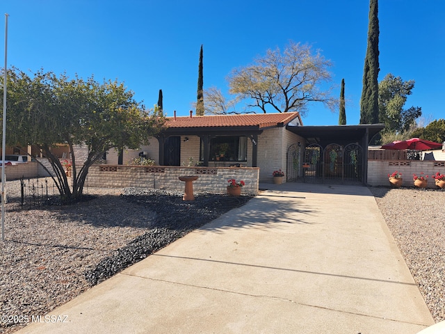 view of front facade with a carport