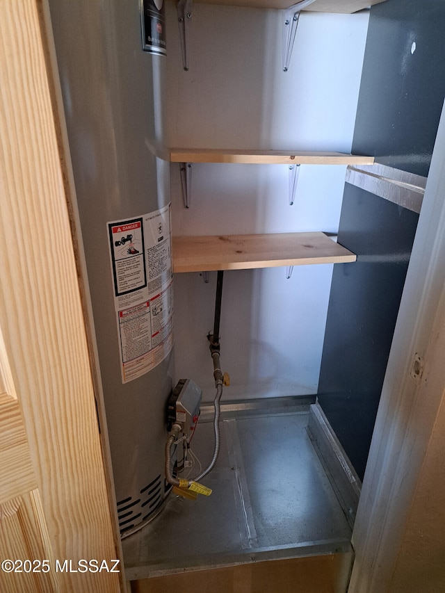 utility room with water heater