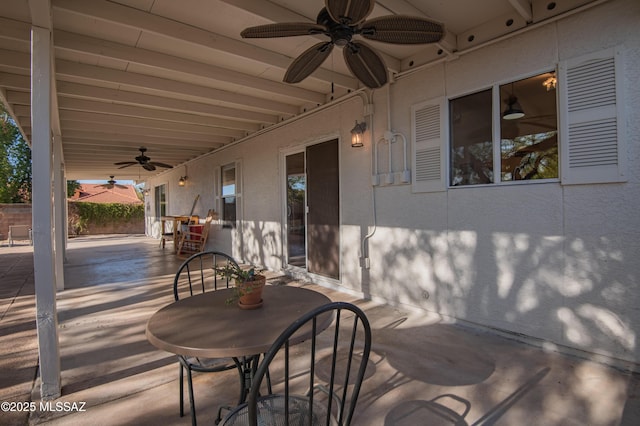 view of patio / terrace featuring ceiling fan