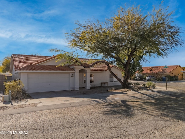 view of front of property featuring a garage