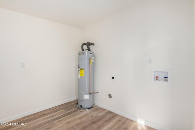 utility room featuring electric water heater