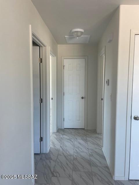 2221 S Sahuara Ave, Tucson, AZ 85711 - hallway featuring marble finish floor