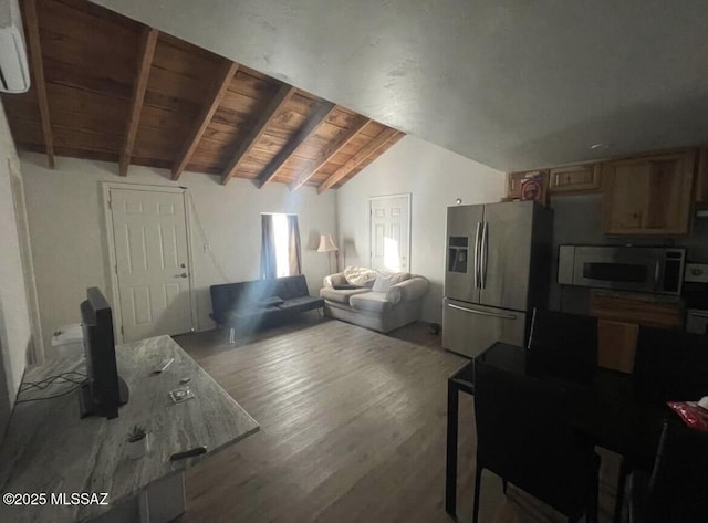 2221 S Sahuara Ave, Tucson, AZ 85711 - living room with lofted ceiling with beams, wooden ceiling, and wood finished floors