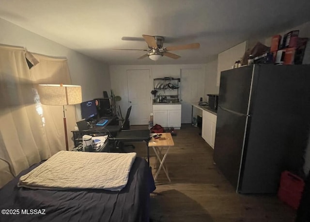 2221 S Sahuara Ave, Tucson, AZ 85711 - bedroom featuring freestanding refrigerator, ceiling fan, and wood finished floors