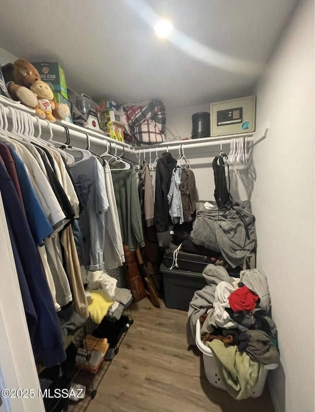 2221 S Sahuara Ave, Tucson, AZ 85711 - walk in closet featuring wood finished floors