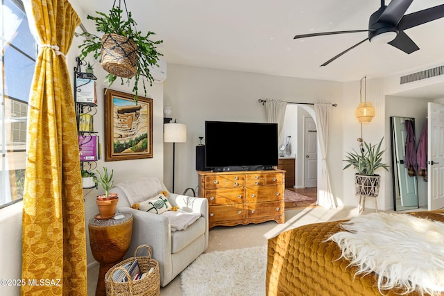 bedroom with ceiling fan and carpet floors