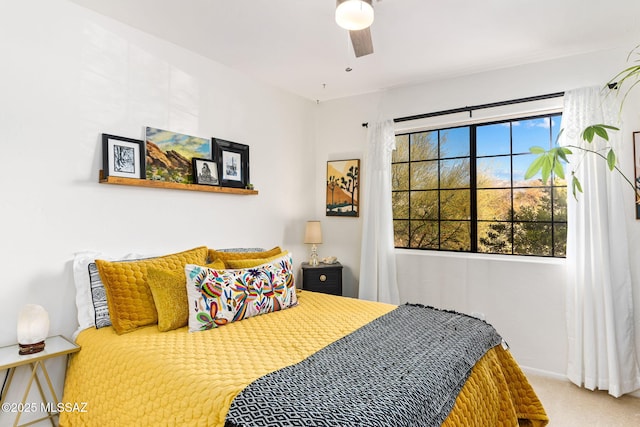 bedroom with carpet and ceiling fan