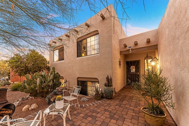 view of property exterior at dusk