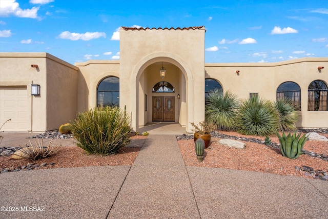 view of front of property with a garage