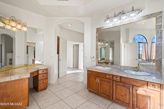 bathroom featuring tile patterned floors and vanity