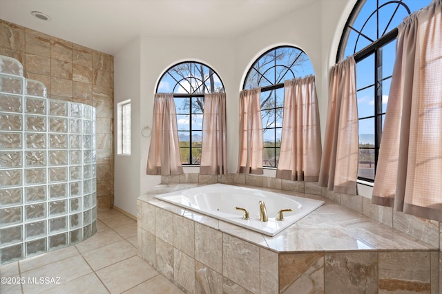 bathroom with tile patterned floors