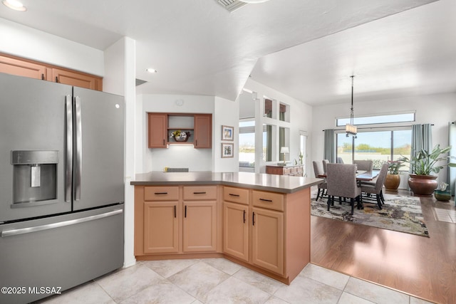 kitchen featuring stainless steel refrigerator with ice dispenser, open shelves, recessed lighting, hanging light fixtures, and light tile patterned flooring