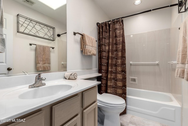 bathroom featuring visible vents, toilet, shower / bath combo, vanity, and tile patterned floors