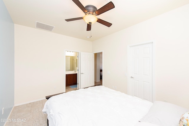 bedroom featuring connected bathroom and ceiling fan