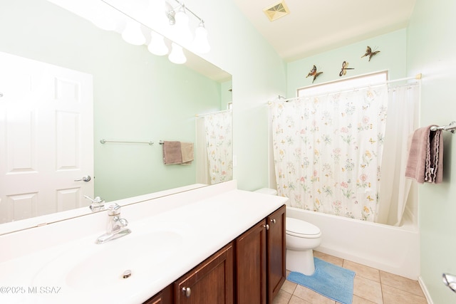 full bathroom with shower / tub combo with curtain, vanity, toilet, and tile patterned flooring