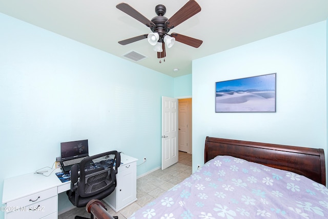 tiled bedroom with ceiling fan